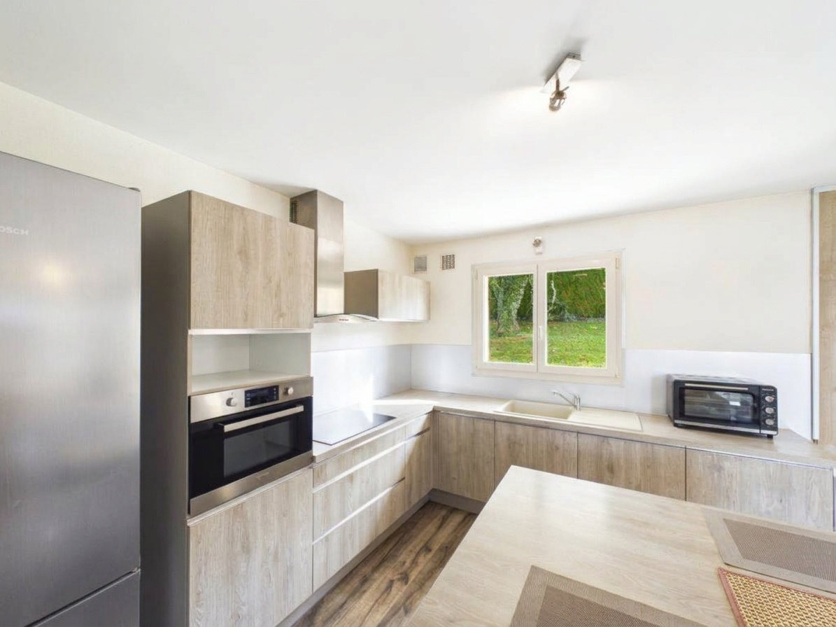 Maison / Villa de 115 m2 comprenant 6 pièces